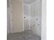 Unfinished laundry room with door and plumbing rough-in at 15084 Mcgraw Ave, Port Charlotte, FL 33953