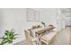 Casual dining area with wood table and bench seating at 1540 Hammer Pl, Largo, FL 33774
