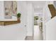 Bright and airy entryway with staircase and view to backyard at 1540 Hammer Pl, Largo, FL 33774