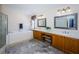 Elegant Primary bathroom with double vanity, soaking tub, and separate shower at 15815 Muirfield Dr, Odessa, FL 33556