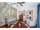 Adorable Bedroom featuring a cowhide rug and rustic dresser at 15815 Muirfield Dr, Odessa, FL 33556