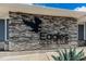Eagles Golf Club entrance with stone facade and logo at 15815 Muirfield Dr, Odessa, FL 33556