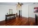 Loft area with hardwood floors and access to a bathroom at 15815 Muirfield Dr, Odessa, FL 33556