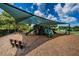 Playground with shaded play area and slides at 15815 Muirfield Dr, Odessa, FL 33556
