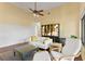 Bright living room with white seating and wood floors at 15904 Wainwright Ct, Tampa, FL 33647