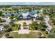 Community clubhouse and surrounding landscape at 18133 Aero Ave, Land O Lakes, FL 34638