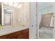 Bathroom with single vanity and shower/tub combo at 20314 Chestnut Grove Dr, Tampa, FL 33647