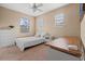 Bedroom with a built-in desk and plenty of light at 20314 Chestnut Grove Dr, Tampa, FL 33647
