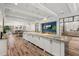 Modern community kitchen with granite countertops and white cabinetry at 20314 Chestnut Grove Dr, Tampa, FL 33647