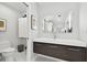 Bright bathroom with a floating vanity and toilet at 21 Crescent S Pl, St Petersburg, FL 33711