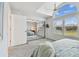 Spacious bedroom with mirrored closet doors and a view at 21 Crescent S Pl, St Petersburg, FL 33711