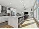 Bright kitchen featuring white cabinets and a spacious island at 21 Crescent S Pl, St Petersburg, FL 33711