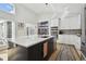 Gourmet kitchen with double ovens and an expansive island at 21 Crescent S Pl, St Petersburg, FL 33711