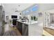 Modern kitchen with stainless steel appliances and a large island at 21 Crescent S Pl, St Petersburg, FL 33711