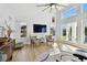 Spacious living room with hardwood floors and large windows at 21 Crescent S Pl, St Petersburg, FL 33711