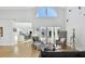 Bright living room with hardwood floors, large windows, and comfortable seating at 21 Crescent S Pl, St Petersburg, FL 33711