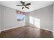 Bedroom with hardwood floors and ceiling fan at 300 Beach Ne Dr # 704, St Petersburg, FL 33701