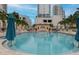 Resort-style pool with surrounding patio and lounge chairs at 300 Beach Ne Dr # 704, St Petersburg, FL 33701