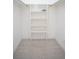 Spacious closet with built-in shelves, providing ample storage at 3853 S Lake Dr # 171, Tampa, FL 33614