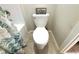 Clean bathroom with a toilet and bathtub at 4208 Unbridled Song Dr, Ruskin, FL 33573