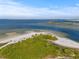 Aerial view of a serene beach landscape with lush greenery at 509 Florida S Cir, Apollo Beach, FL 33572
