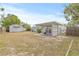 Large backyard with shed and patio at 509 Florida S Cir, Apollo Beach, FL 33572