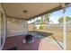 Relaxing backyard patio with fire pit and lattice fence at 509 Florida S Cir, Apollo Beach, FL 33572