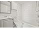 Clean bathroom with white tile, a bathtub, and a vanity at 509 Florida S Cir, Apollo Beach, FL 33572