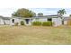 Remodeled home with a spacious front yard at 509 Florida S Cir, Apollo Beach, FL 33572