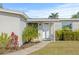 Inviting front entrance with updated landscaping at 509 Florida S Cir, Apollo Beach, FL 33572