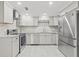 Modern kitchen with stainless steel appliances and granite countertops at 509 Florida S Cir, Apollo Beach, FL 33572