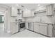 Stainless steel appliances and granite countertops at 509 Florida S Cir, Apollo Beach, FL 33572