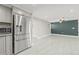 Stainless steel refrigerator in modern kitchen at 509 Florida S Cir, Apollo Beach, FL 33572
