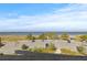 View from balcony overlooking ocean, parking lot and park at 509 Florida S Cir, Apollo Beach, FL 33572