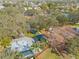 Aerial view of a playground with play structures, a water feature, and shaded seating at 509 Florida S Cir, Apollo Beach, FL 33572