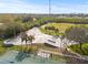 Aerial view of a community skate park with ramps, benches, and palm trees at 509 Florida S Cir, Apollo Beach, FL 33572