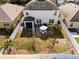 Aerial view showcasing home with solar panels and backyard at 5119 11Th E St, Bradenton, FL 34203