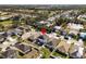 Aerial view of a two-story house in a quiet residential neighborhood at 5119 11Th E St, Bradenton, FL 34203