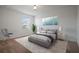Bright bedroom with a comfortable bed and sitting area at 5119 11Th E St, Bradenton, FL 34203