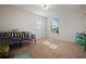 Cozy bedroom with a bed and window at 5119 11Th E St, Bradenton, FL 34203