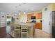 Island kitchen with stainless steel appliances at 5119 11Th E St, Bradenton, FL 34203