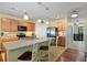 Kitchen with island and stainless steel appliances at 5119 11Th E St, Bradenton, FL 34203