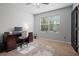 Home office with built-in desk and large window at 5119 11Th E St, Bradenton, FL 34203