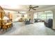 Spacious living room with comfortable seating and a view into another living area at 518 S Larry Cir, Brandon, FL 33511