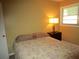 Relaxing bedroom with a queen bed and a teddy bear at 5876 21St N St # 3, St Petersburg, FL 33714
