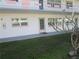 Exterior view of building showing entrance and landscaping at 5876 21St N St # 3, St Petersburg, FL 33714