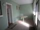 Light and airy Florida room with table and carpet at 5876 21St N St # 3, St Petersburg, FL 33714