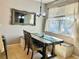 Bright dining area with built-in bench seating at 6047 Twin Bridges Dr, Zephyrhills, FL 33541