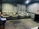 Relax and enjoy movie nights in this home theater, complete with comfortable seating at 6047 Twin Bridges Dr, Zephyrhills, FL 33541
