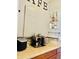 Coffee bar with espresso machine and various coffee supplies at 6047 Twin Bridges Dr, Zephyrhills, FL 33541